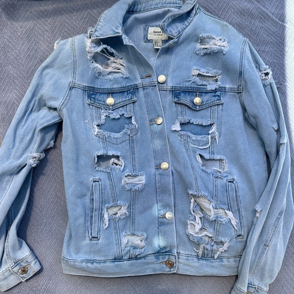 Women destroyed Jean jacket